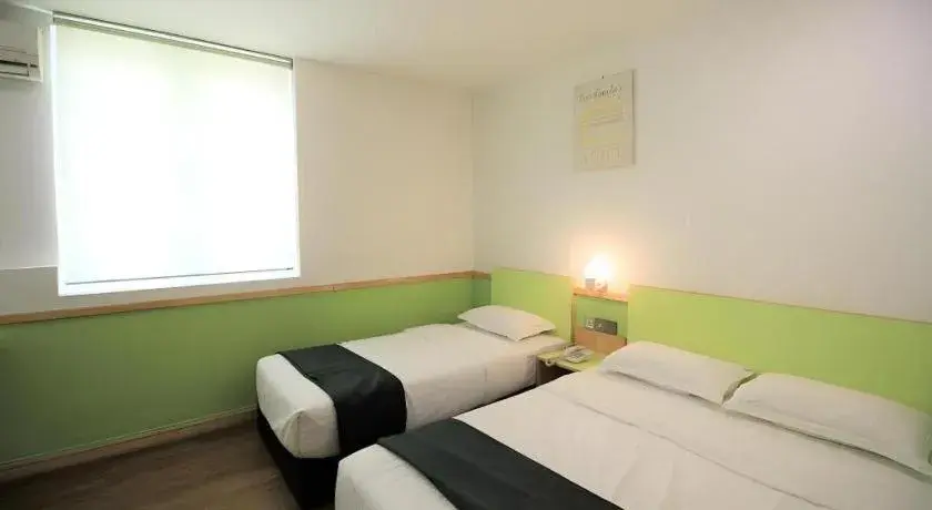 Bed in HOTEL JSIA Bed in HOTEL JSIA