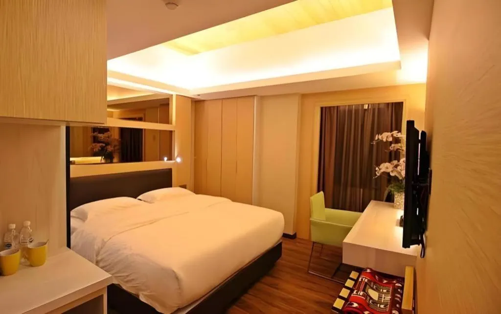 Bed in JC Mark Hotel