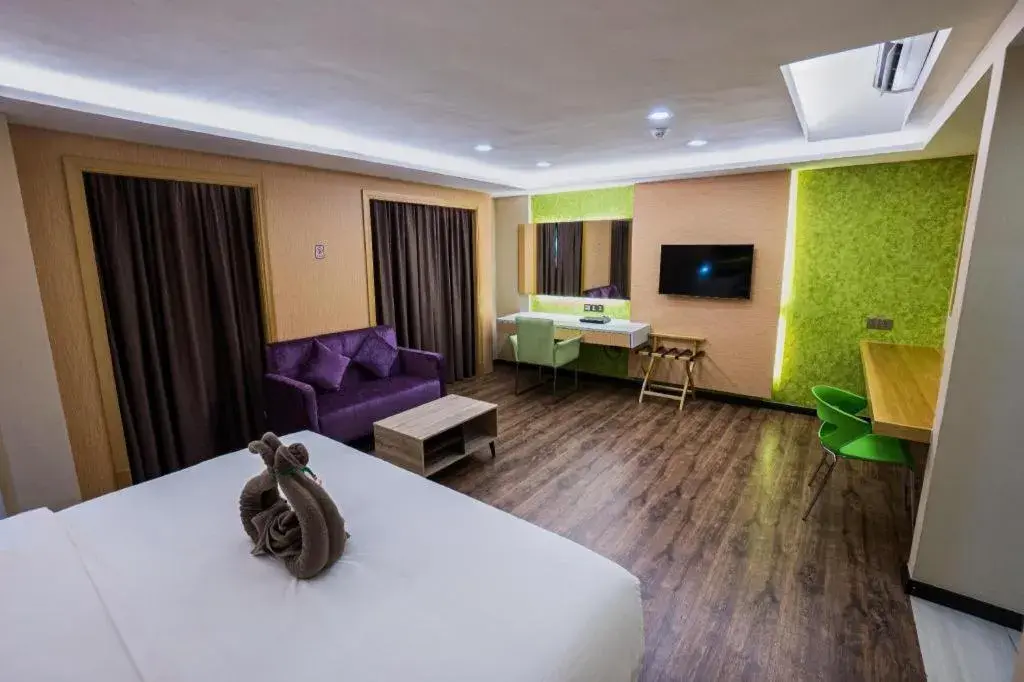 Bed in JC Mark Hotel Bed in JC Mark Hotel