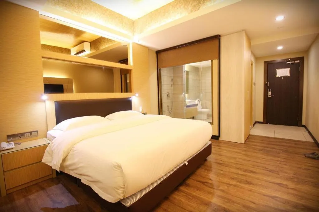 Bed in JC Mark Hotel