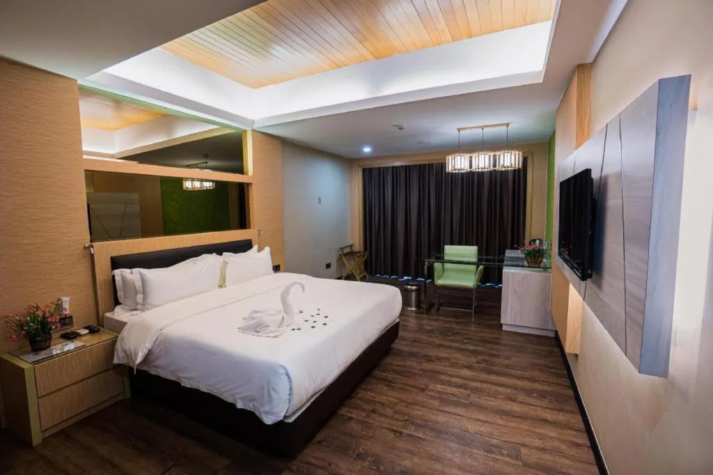 Bed in JC Mark Hotel