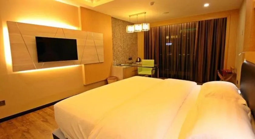 Bed in JC Mark Hotel