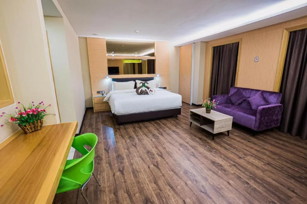 Bed in JC Mark Hotel