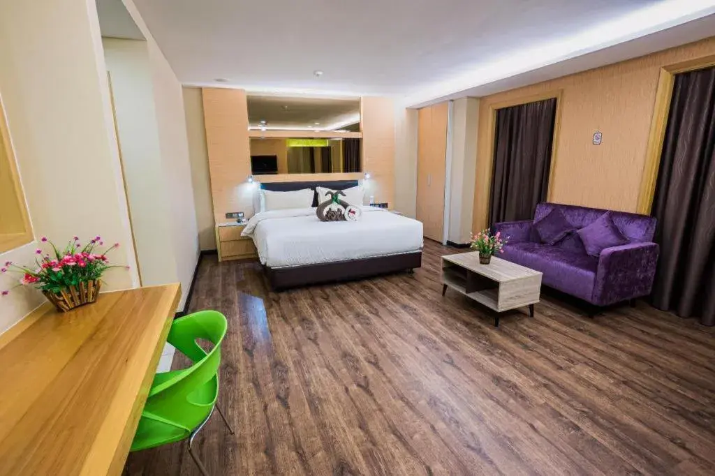 Bed in JC Mark Hotel Bed in JC Mark Hotel