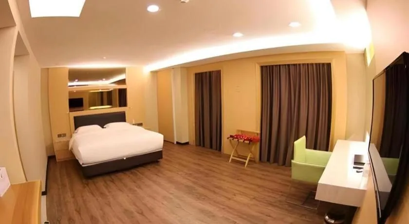 Bed in JC Mark Hotel