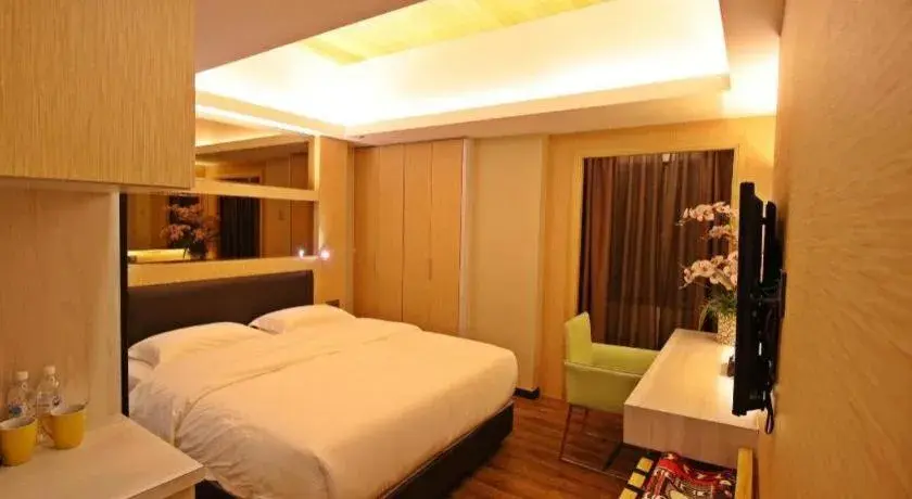 Bed in JC Mark Hotel Bed in JC Mark Hotel