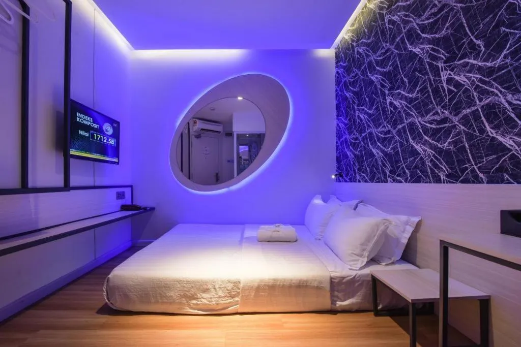 Bed in Laman Green The Boutique Hotel