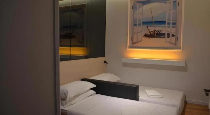 Bed in Laman Green The Boutique Hotel