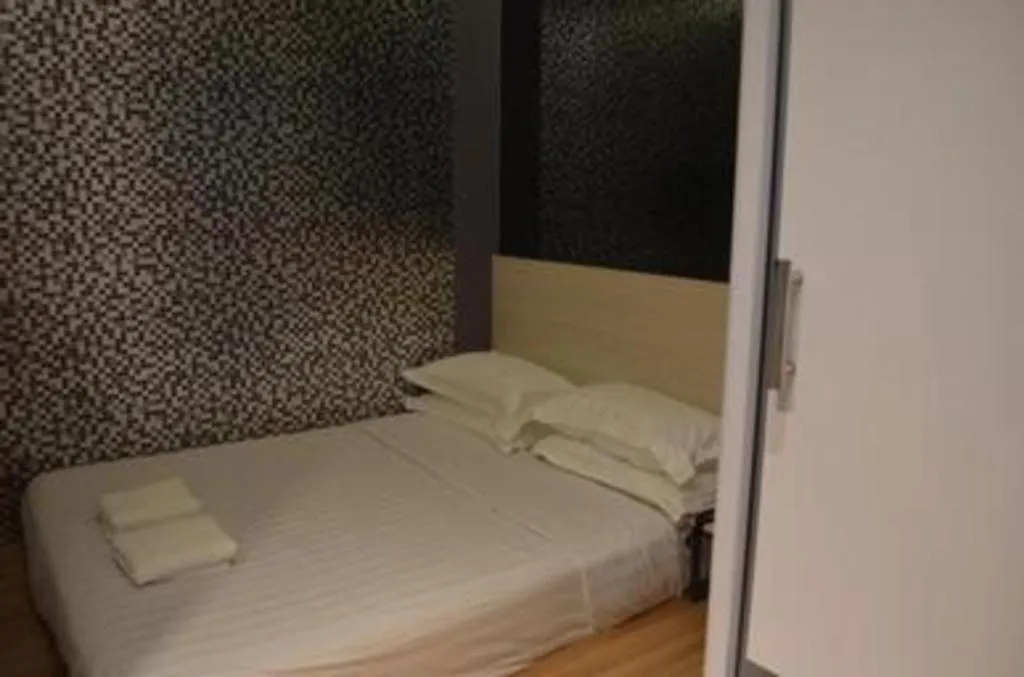 Bed in Laman Green The Boutique Hotel