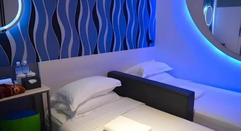 Bed in Laman Green The Boutique Hotel