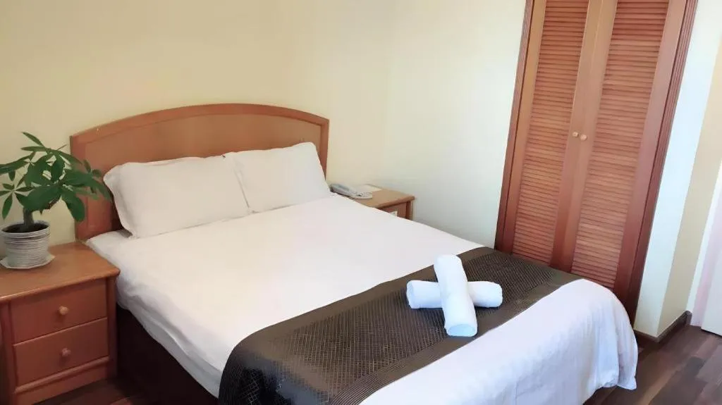 Bed in Global Hotel Labuan