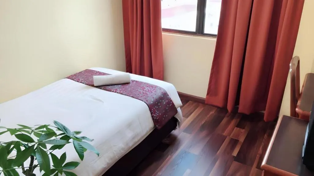 Bed in Global Hotel Labuan