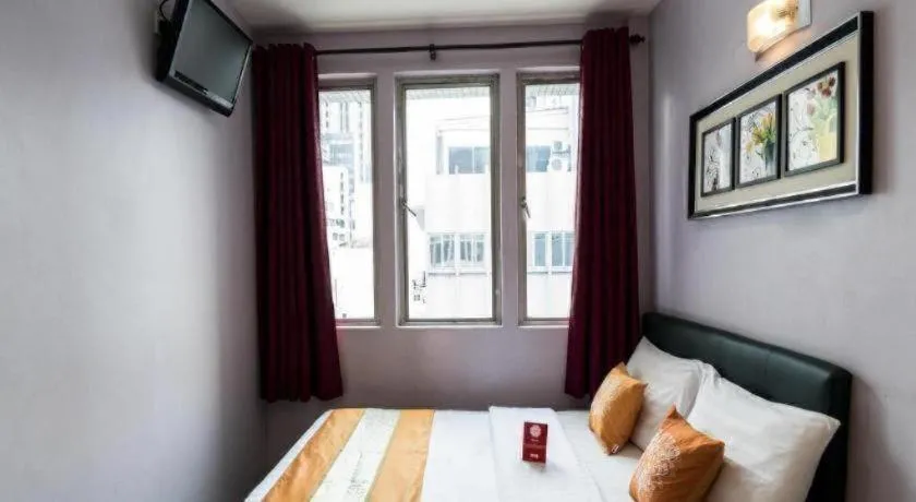 Bed in OYO 191 ML Inn Hotel
