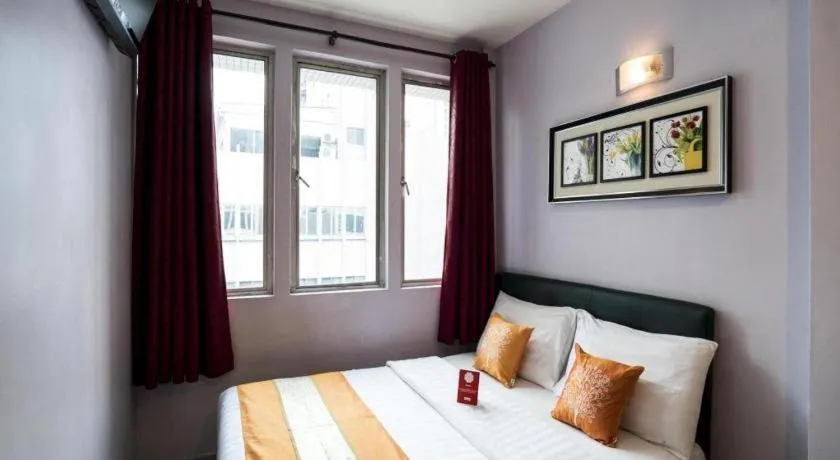 Bed in OYO 191 ML Inn Hotel