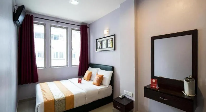 Bed in OYO 191 ML Inn Hotel
