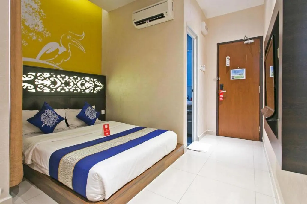 Bed in OYO 288 Sri Enstek Hotel