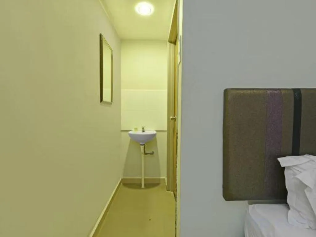 Bed in OYO 90553 Hotel 24 Seven