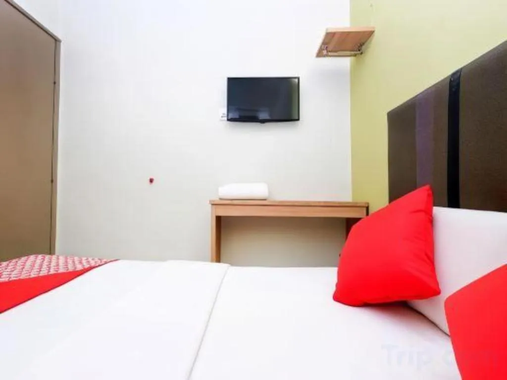 Bed in OYO 90553 Hotel 24 Seven