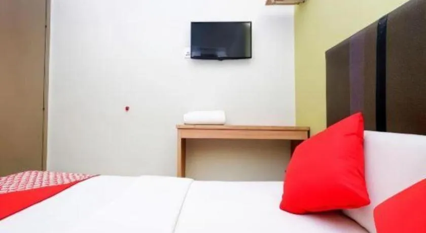 Bed in OYO 90553 Hotel 24 Seven