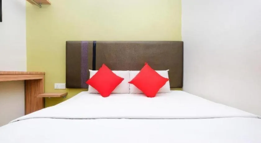 Bed in OYO 90553 Hotel 24 Seven