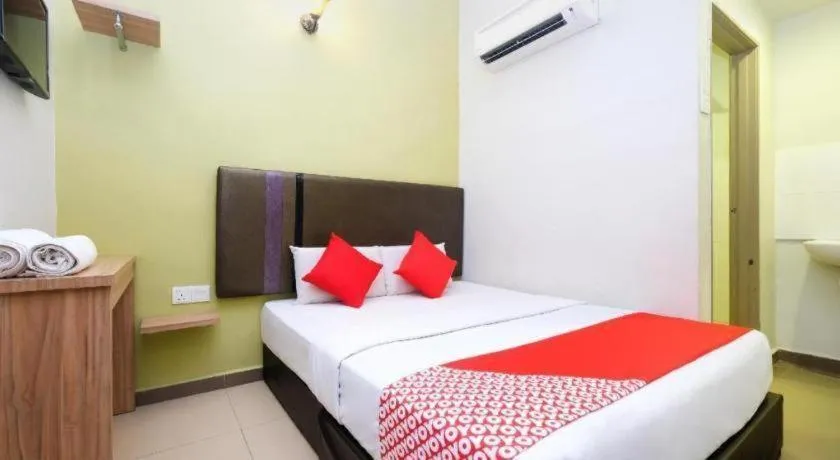 Bed in OYO 90553 Hotel 24 Seven