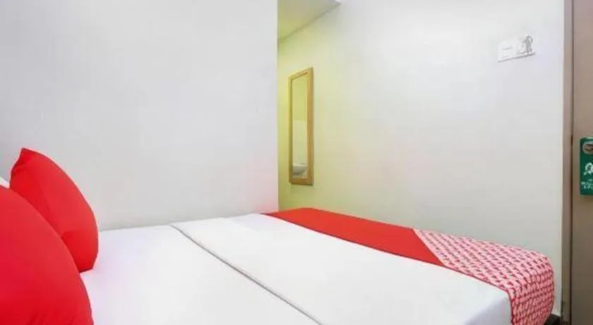 Bed in OYO 90553 Hotel 24 Seven