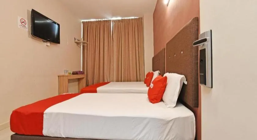 Bed in Capital O 90556 Hotel Cherita Rooms