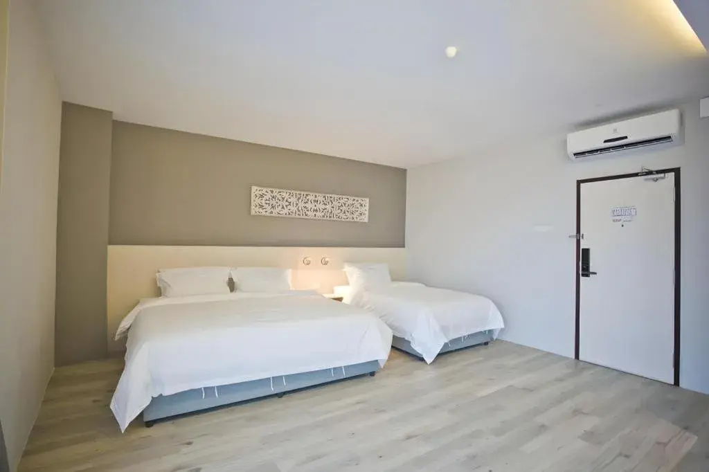 Bed in M Plus Boutique Hotel Bed in M Plus Boutique Hotel