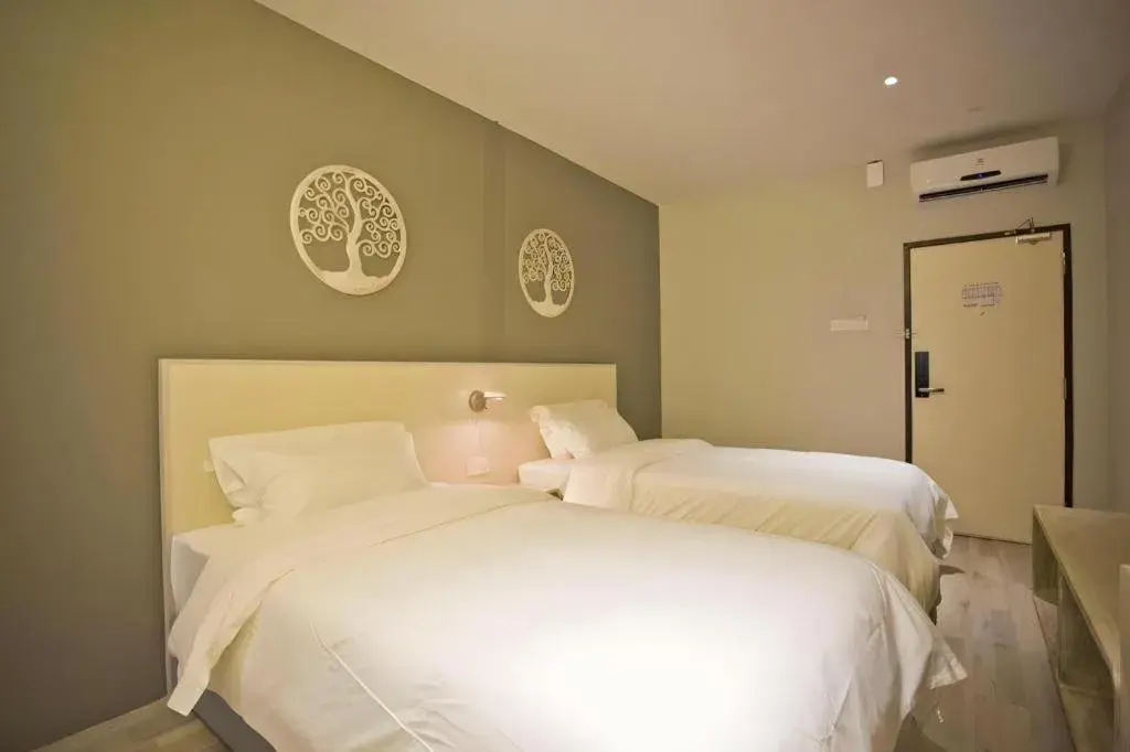 Bed in M Plus Boutique Hotel Bed in M Plus Boutique Hotel