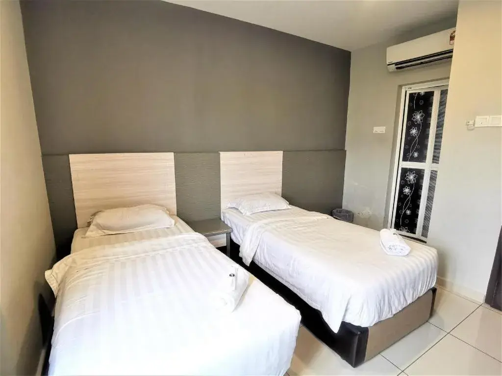 Bed in Pearl Hotel Bed in Pearl Hotel