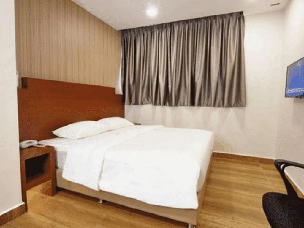 Bed in Elegant Hotel