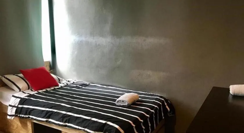 Bed in Koptel Budget Hotel