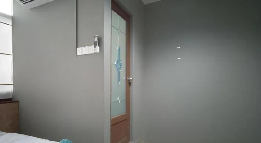 Bed in Koptel Budget Hotel