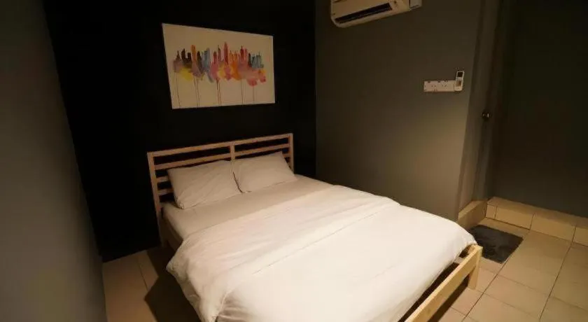 Bed in Koptel Budget Hotel