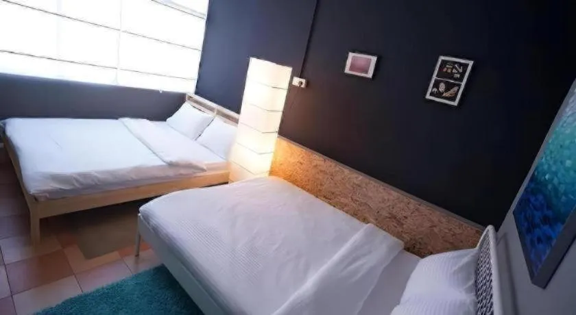 Bed in Koptel Budget Hotel