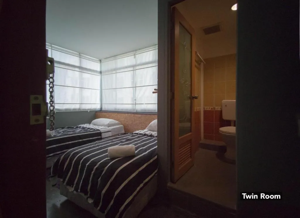 Bed in Koptel Budget Hotel