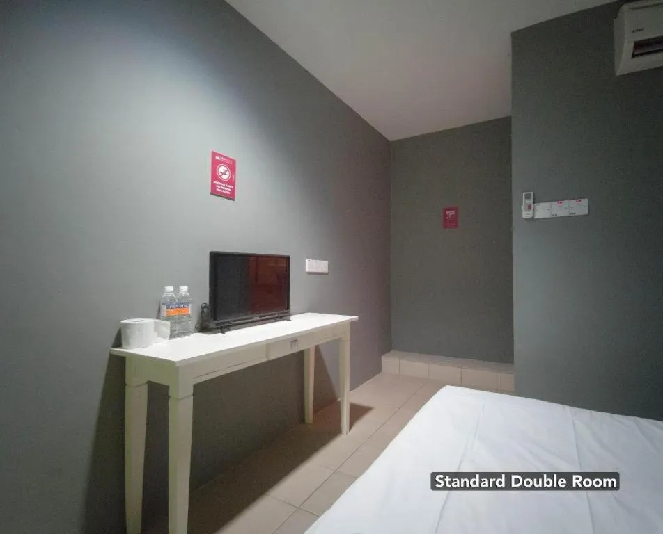 Bed in Koptel Budget Hotel