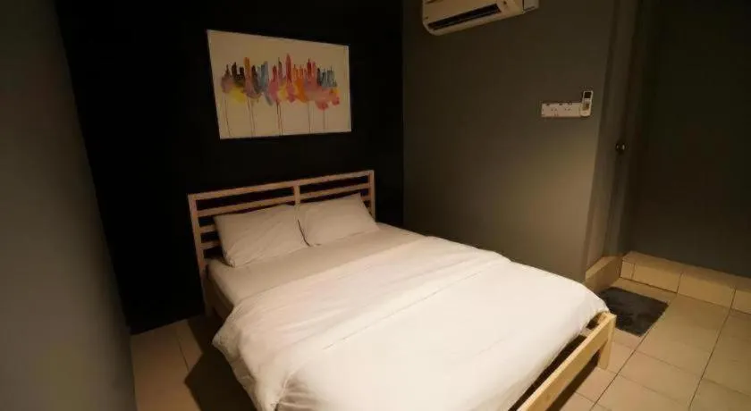 Bed in Koptel Budget Hotel