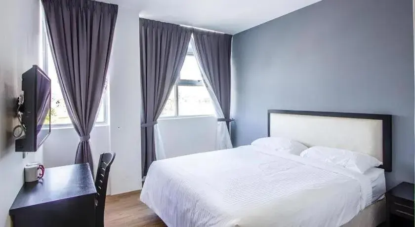 Bed in Big Orange Hotel Jitra Bed in Big Orange Hotel Jitra