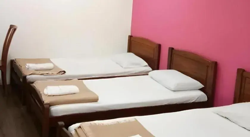 Bed in Twin Star Hotel Bed in Twin Star Hotel