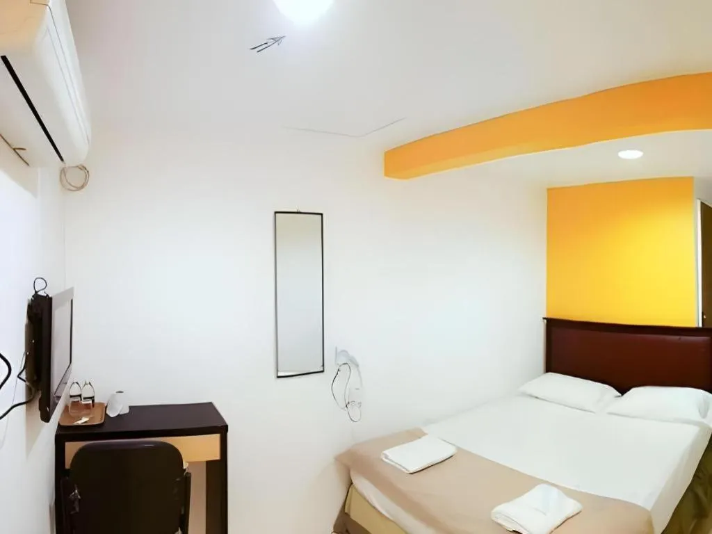 Bed in Twin Star Hotel