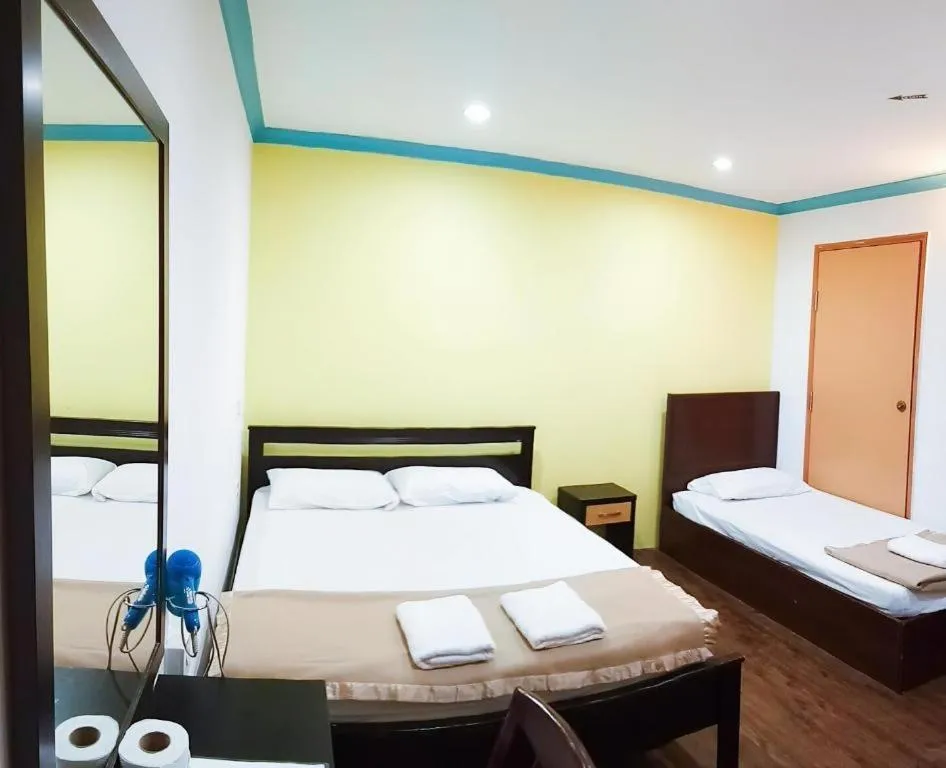 Bed in Twin Star Hotel