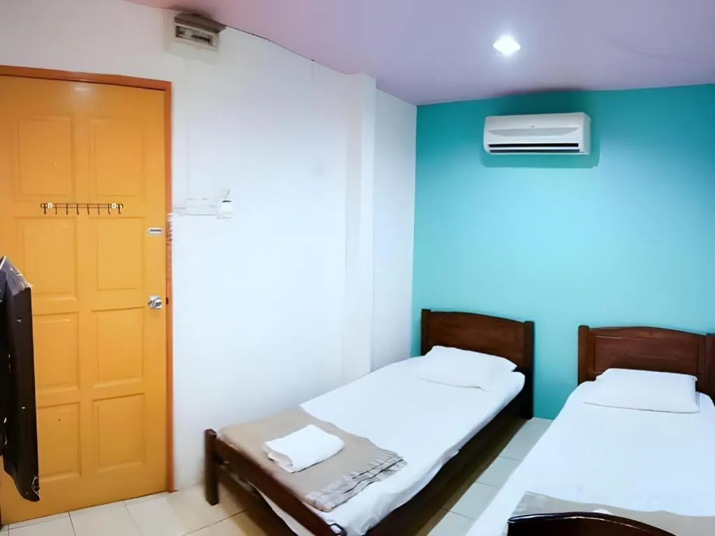 Bed in Twin Star Hotel