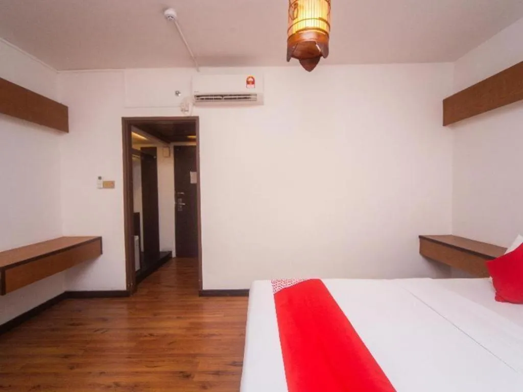 Bed in OYO 304 Zero Hour Hotel