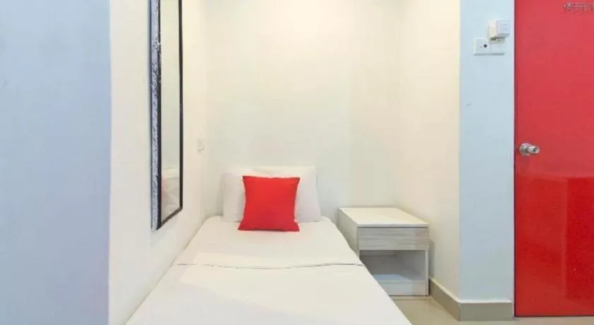 Bed in OYO 304 Zero Hour Hotel