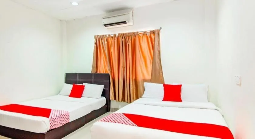 Bed in OYO 304 Zero Hour Hotel