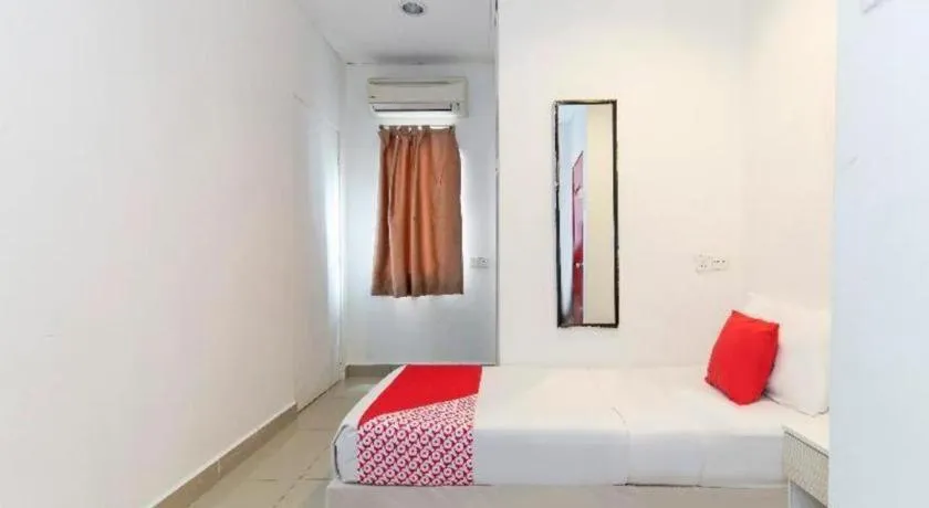 Bed in OYO 304 Zero Hour Hotel