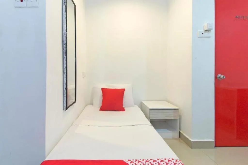 Bed in OYO 304 Zero Hour Hotel