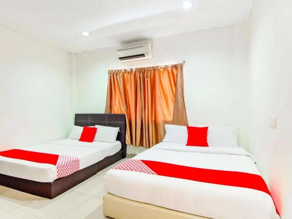 Bed in OYO 304 Zero Hour Hotel