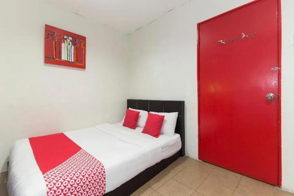 Bed in OYO 304 Zero Hour Hotel